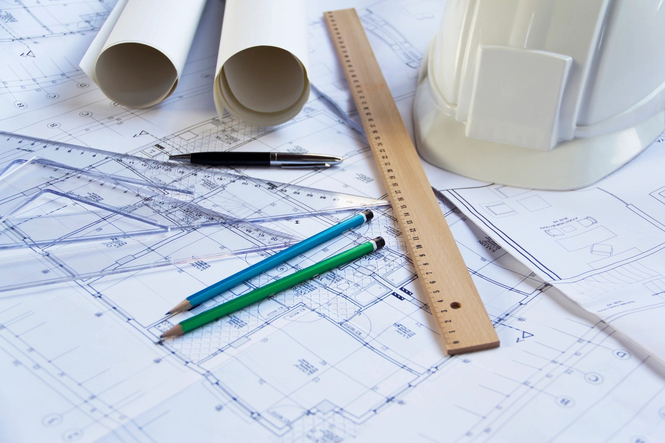 Architect workspace with blueprints