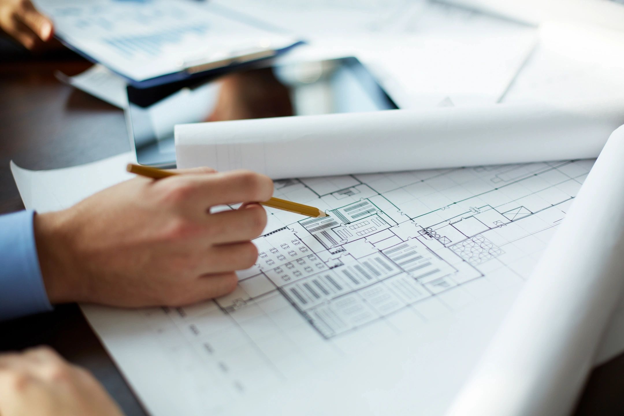 Architect reviewing floor plans
